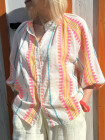 Blouse motifs ethniques fluo manches bouffantes