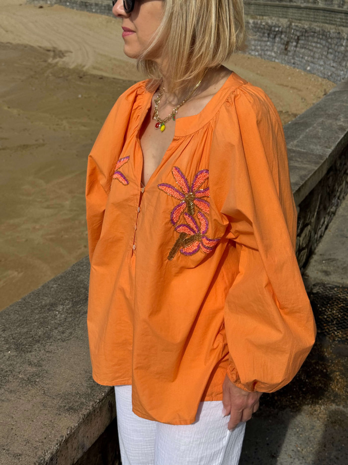 Blouse orange motifs palmiers