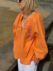 Blouse orange motifs palmiers