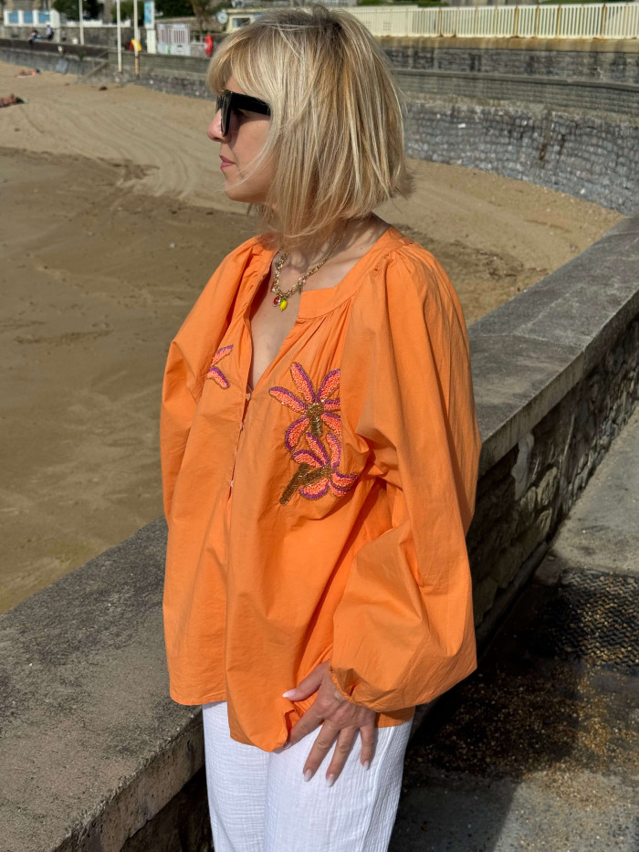 Blouse orange motifs palmiers