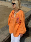 Blouse orange motifs palmiers