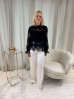 Blouse en dentelle noire